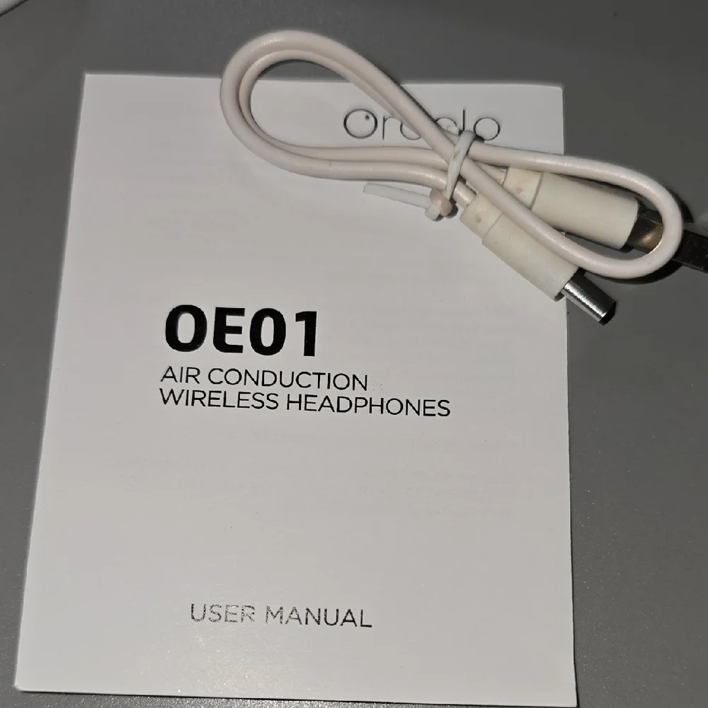 (001) Oraolo Wireless Earbuds in Black and White
